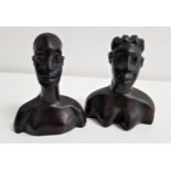 PAIR OF CARVED AFRICAN EBONY BUSTS depicting a man and woman, the bases marked NBCI, 16cm high