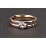 DIAMOND SOLITAIRE RING the round brilliant cut diamond approximately 0.33cts on wide eighteen