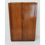 1930s TEAK WARDROBE with a pair of panelled doors opening to reveal an internal mirror and hanging
