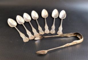 SEVEN VICTORIAN SILVER TEA SPOONS in the Kings pattern and a matching pair of sugar tongs, Glasgow