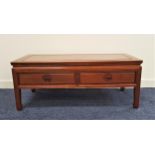 CHINESE TEAK LOW OCCASIONAL TABLE with a rectangular top above two panelled frieze drawers, standing
