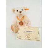 STEIFF THE MILLENNIUM BEAR wearing medallion, number 11591, made exclusively for Danbury Mint,