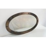 OVAL METAL FRAME WALL MIRROR with a bevelled plate, 85cm wide