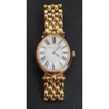 LADIES FREDERIQUE CONSTANT WRISTWATCH the oval dial with Roman numerals, on gilt bracelet strap, the