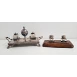 OAK DESK STAND with a pen trough and two square glass ink bottles with lift up silver plated lids,
