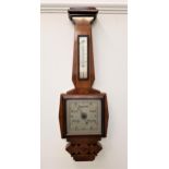 T.A.REYNOLDS, SON & WARDLE WALNUT BAROMETER with a thermometer on a silvered metal scale above a