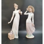 TWO LLADRO FIGURINES comprising Breezy afternoon - number 5682, 31cm high; and Travelling Companions