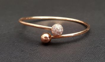 TIFFANY & CO DIAMOND BALL BYPASS BRACELET in eighteen carat rose gold, the diamonds totalling 1.