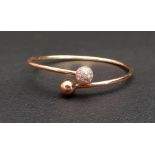 TIFFANY & CO DIAMOND BALL BYPASS BRACELET in eighteen carat rose gold, the diamonds totalling 1.