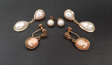 THREE PAIRS OF NINE CARAT GOLD MOUNTED EARRINGS comprising a pair of cameo set drop earrings, a pair