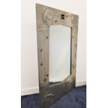 LARGE ART NOUVEAU WALL MIRROR the hammered pewter frame with stylised motifs and enamel decoration