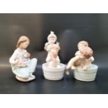 THREE LLADRO FIGURINES comprising Bathing Beauties - number 6457; Bath Time - number 6411; and