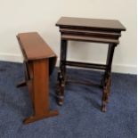MAHOGANY NEST OF TABLES with rectangular tops and standing on lyre end supports, 60cm high, together