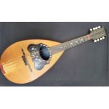 CONTINENTAL MANDOLIN with a rosewood body and a tortoiseshell and mother of pearl soundhole