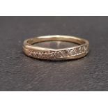 DIAMOND SET RING of crossover design in nine carat gold, ring size Q and approximately 1.5 grams