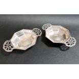 PAIR OF GEORGE VI SILVER BON BON DISHES with octagonal bodies and pierced handles, 12.5cm wide,