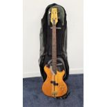 WESTONE THUNDER I-A BASS GUITAR with an elm body and rosewood neck with mother of pearl inlay,