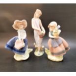 THREE LLADRO FIGURINES comprising Pretty Pickings - number 5222; Spring is Here - number 5223; and