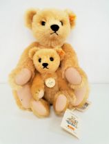 TWO STEIFF CLASSIC SERIES 1909 TEDDY BEARS both in angora mohair plush, the larger example with
