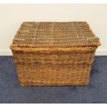 LARGE WICKER BASKET with a lift up lid and side carrying handles, 56cm x 83.5cm x 63cm