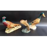 THREE BESWICK ANIMAL ORNAMENTS comprising a pheasant, No1225, 19cm high, a trout, No1032, 16.5cm