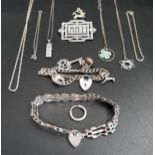 SELECTION OF SILVER JEWELLERY comprising a gate bracelet with heart padlock clasp, a charm bracelet,