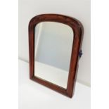 LATE VICTORIAN STAINED PINE MIRROR with an arched frame and plate, previously from a dressing chest,