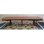 WILLIAM IV MAHOGANY EXTENDING TABLE with D ends and four leaves, on a turned fluted column with