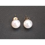PAIR OF PEARL STUD EARRINGS in fourteen carat gold mounts and with nine carat gold butterflies