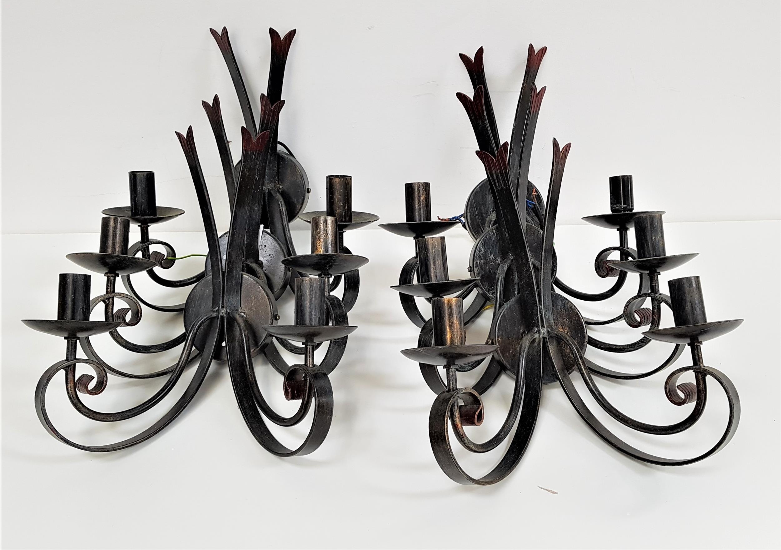 SET OF SIX STEEL WALL LIGHTS each with twin scroll arms on circular mounts, 36cm high (6)