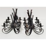 SET OF SIX STEEL WALL LIGHTS each with twin scroll arms on circular mounts, 36cm high (6)