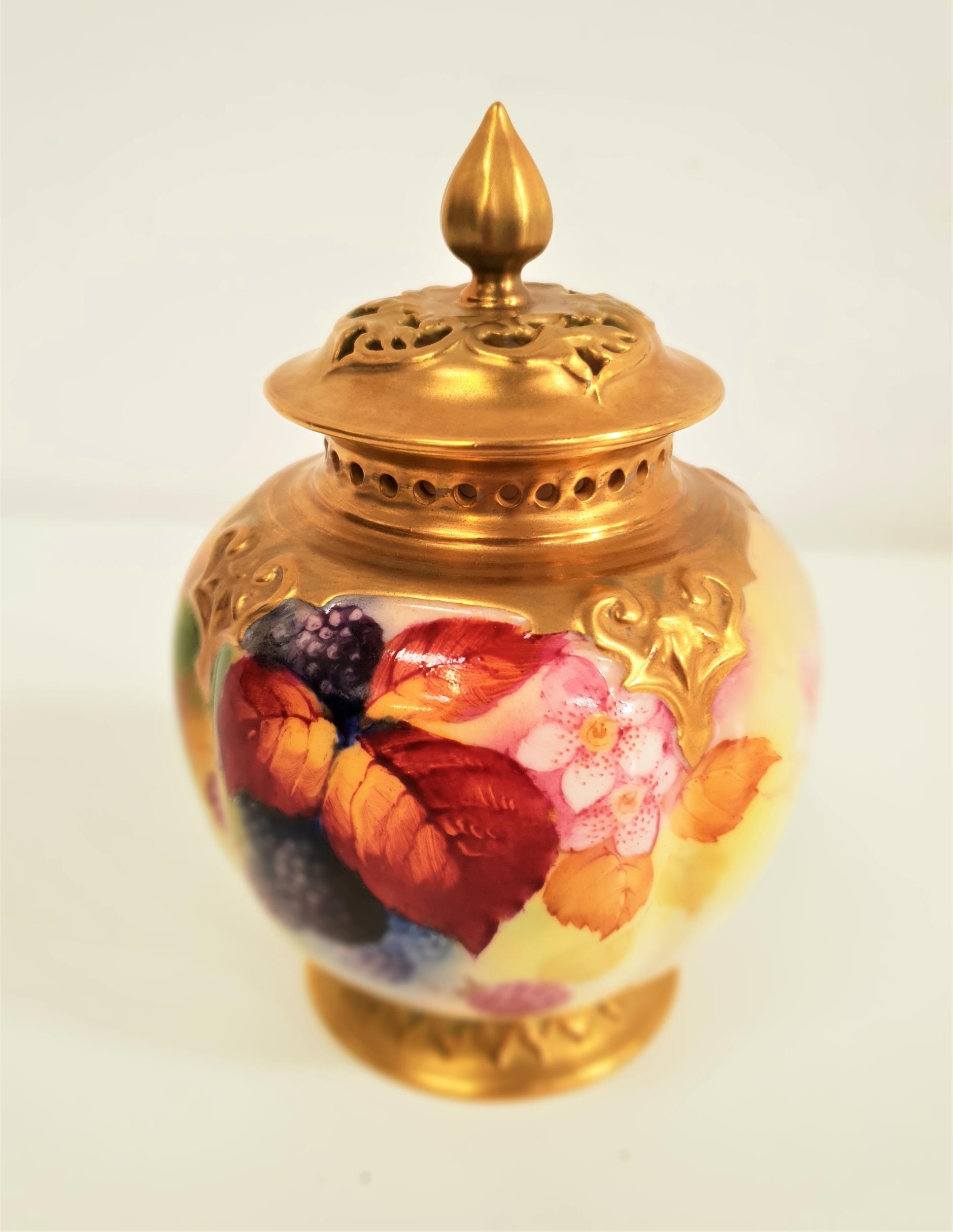 ROYAL WORCESTER POT POURRI VASE AND COVER of bulbous form, decorated with fruit and foliage by Kitty
