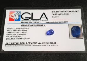 CERTIFIED LOOSE TANZANITE the oval cabochon gemstone weighing 3.05cts, with GLA gemological report