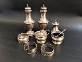 MIXED LOT OF SILVER including two sugar casters, Birmingham 1908; three napkin rings, two Birmingham