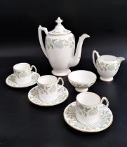 COALPORT COFFEE SET decorated in the Waltz Of The Flowers pattern and comprising a lidded coffee