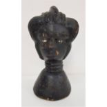 EARLY 20th CENTURY CARVED AFRICAN HEAD depicting a lady with braided hair and multiple neck rings,