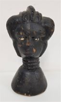 EARLY 20th CENTURY CARVED AFRICAN HEAD depicting a lady with braided hair and multiple neck rings,