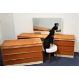 PART SUITE OF RETRO TEAK BEDROOM FURNITURE including a mirror back kneehole dressing table with a