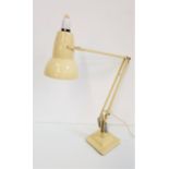 HERBERT TERRY & SONS ANGLEPOISE LAMP in cream and raised on a square stepped base