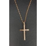 UNMARKED GOLD CROSS PENDANT ON A NINE CARAT GOLD BELCHER LINK CHAIN with decorative engraving on the