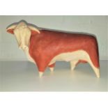 POTTERY HEREFORD STYLE BULL by Paul Smith and numbered 50/75, 17.5cm high