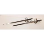 PAIR OF SPANISH STYLE DUELING SWORDS of steel construction with engraved 43.5cm long blades with