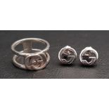 SELECTION OF GUCCI JEWELLERY comprising a Gucci interlocking G wide open band ring and a pair of