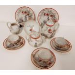 JAPANESE EGG SHELL PORCELAIN TEA SERVICE decorated with figures and cherry blossom, comprising a
