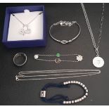 SELECTION OF FASHION JEWELLERY comprising a Swarovski lifelong collection silver bow necklace,