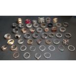 SELECTION OF SILVER AND OTHER RINGS including spinner rings, large statement rings, CZ and