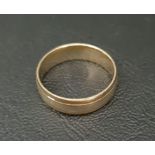 NINE CARAT GOLD WEDDING BAND with double line engraving, ring size T-U and approximately 4.6 grams