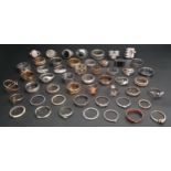 SELECTION OF SILVER AND OTHER RINGS including CZ set rings, large statement rings, signet style