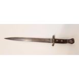 BRITISH 1888 PATTERN BAYONET with a 30cm steel blade marked with the broad arrow, with a wooden grip