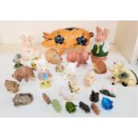 LARGE SELECTION OF POTTERY AND OTHER PIG ORNAMENTS including two Wade piggy banks from the Natwest